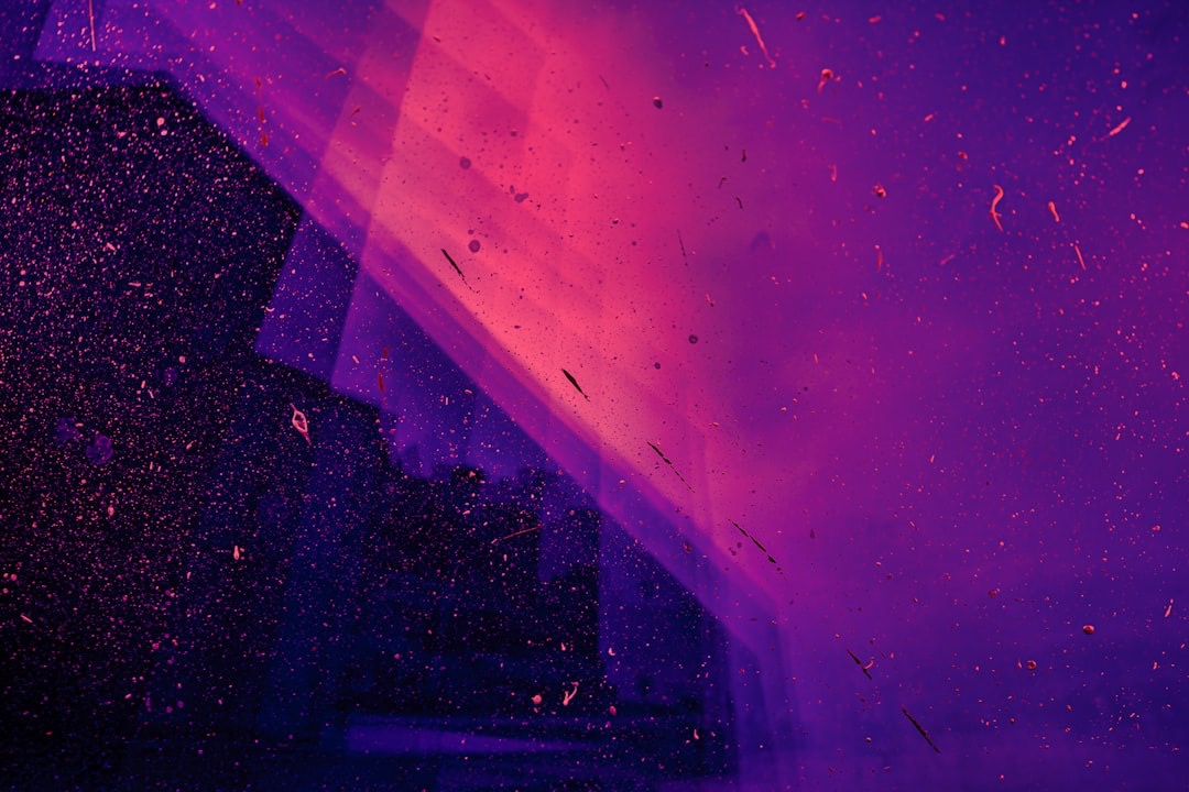 neon pink and purple light particles